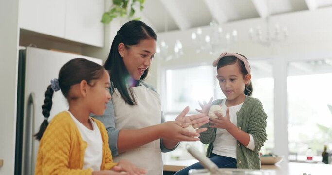 Teaching, baking and a mother with her children in the kitchen of a home together for cooking fun. Family, love and sister kids learning how to bake with their parent in a house for child development