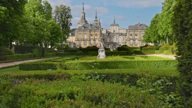 Royal Palace of La Granja de San Ildefonso, Spain. Gimbal shot of lawns, statues and La Granja Palace with park