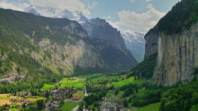 Gorgeous mountains with glaciers, waterfalls and valley - nature of Swiss Alps. Aerial view of lauterbrunnen valley in Switzerland. Swiss alpine village Lauterbrunnen