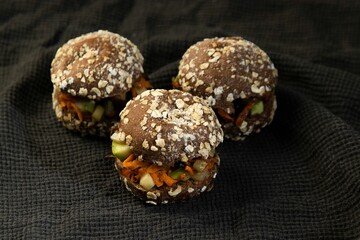 Appetizing selection of small buns filled with carrot and cucumber healthy vegetable filling