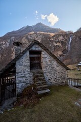 Quaint little stone house nestled in a natural landscape