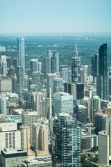 Vertical shot of a cityscape full of tall buildings