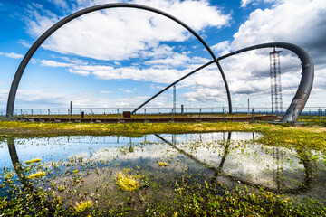 Modern horizon observatory on Halde Hoheward in Herten, Germany, with beautiful reflection after...