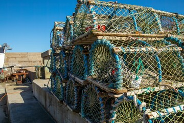 Lobster pots drying out in the sunshine at the harbor
