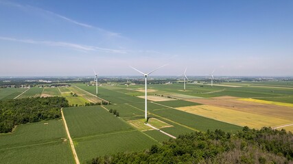 Aerial view of the Maintenance and repair of a wind turbine in farmland in Canada