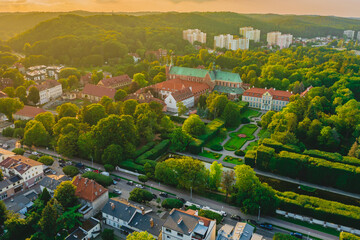Abbey Palace in Oliwa at sunset. Drone view. - obrazy, fototapety, plakaty