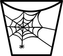 A glass with a cobweb and a spider for Halloween.
