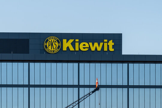 Omaha, NE, USA - May 6, 2023: Kiewit sign on its headquarters building in Omaha, NE, USA. Kiewit Corporation is an American privately held construction company. 