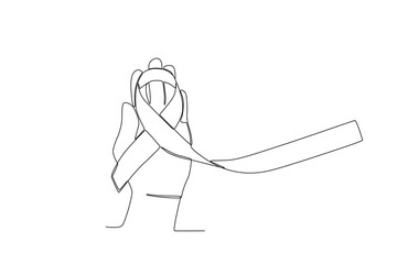 A hand holding a ribbon. Pregnancy and infant loss awareness month