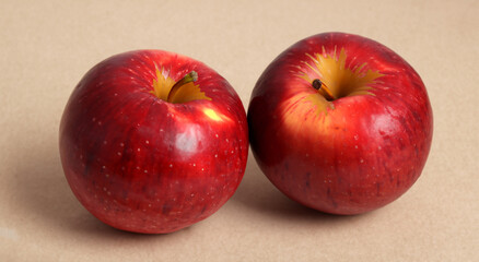 2 perfectly red and beautiful apples