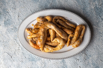 Traditional delicious Turkish cuisine, Middle Eastern dishes, offal dishes, stuffed sheep intestines (Turkish name; Mumbar dolmasi)