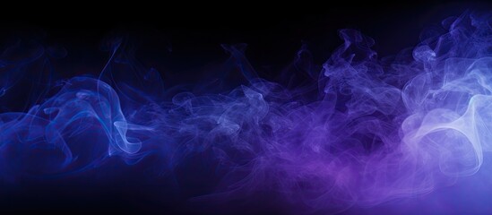 Blue and purple mist on a black surface, with empty area for text.
