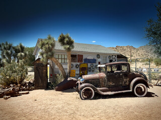 Old rusty car on a desert - route 66