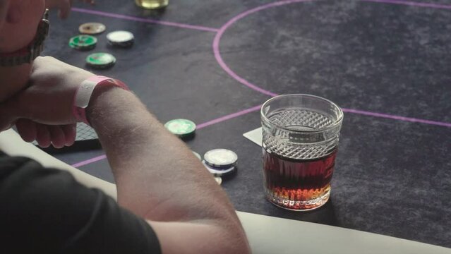 poker table during a game close-up. Player Chips and cards on the table. Casino gambling
