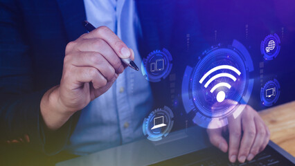 Businessman using touching with wifi icon. Social network business communication concept, Wifi wireless concept free network Internet concept.