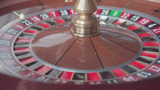 Casino roulette, gambling at the fortune table and money