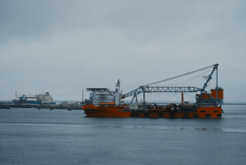 Port of Rotterdam, the Netherlands - 05 05 2023: Windfarm installation vessel in the port. Offshore service and construction vessel