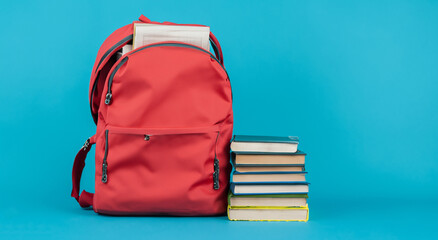 beautiful red school bag on a blue background