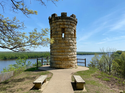 The Julien Dubuque Monument atop a limestone bluff over Mississippi River at the Mines of Spain in Dubuque, Iowa. Julien Dubuque, a Canadian, founded Dubuque as a lead mine in the 1700s. 