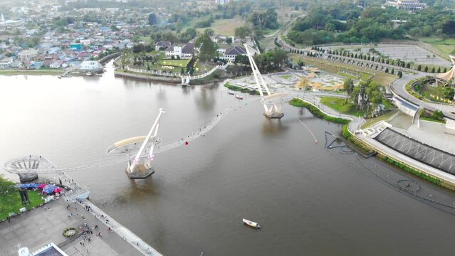 Beautiful aerial view of Darul Hana Bridge over Sungai Sarawak