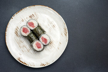 Fototapeta na wymiar Delicious tuna roll, Japanese cuisine. Close up 