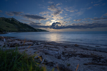 Fototapeta na wymiar Moonlit beach north of Gisborne, New Zealand