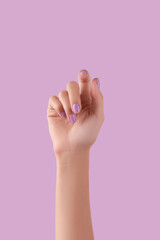 Womans hand with trendy lavender manicure. Spring summer nail design