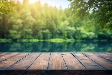 Empty wooden table top with blur background of summer lakes green forest. High quality photo