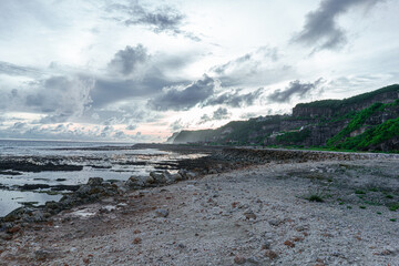 Skyline view of rocky hills from Melasti beach Bali in the evening with beautiful clouds