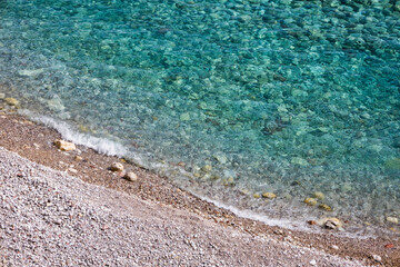 Fototapeta na wymiar Stony beach lagoon in Montenegro