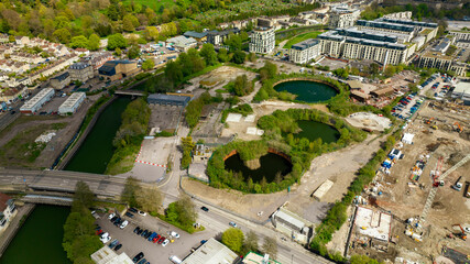 Fototapeta premium Aerial Drone view of The disused Bath gasworks site that has been vacant since 1971 and now forms part of the Bath Western Riverside development.