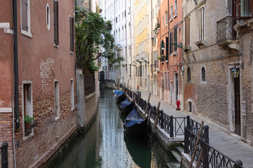 Beautiful Side Canal with Gondolas in Venice