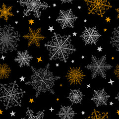 Fototapeta na wymiar Christmas seamless pattern of beautiful complex white and yellow snowflakes on black background. Winter illustration with falling snow