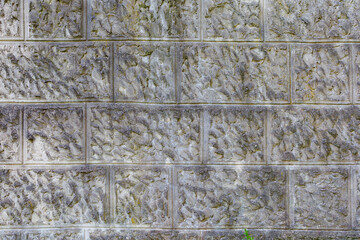 Plaster imitating natural stone. Rough textured wall surface. Background or backdrop. Blank for design