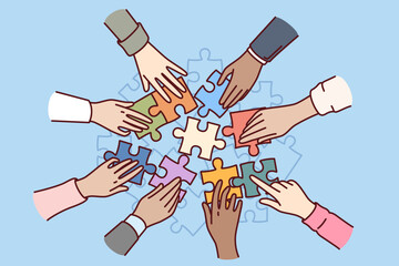 Hands business people with puzzle symbolizing teamwork and joint execution of tasks or creation of strategy. Teamwork of company management team to improve existing business solutions