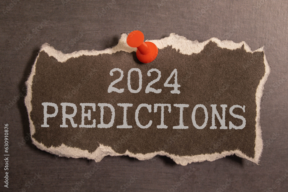 Poster 2024 predictive analytics text on yellow sticker on white keyboard.
