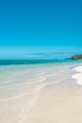 Fototapeta premium Lanikai Beach or Kaʻōhao Beach is located in Kaʻōhao, a community in the town of Kailua and on the windward coast of Oahu, Hawaii. 