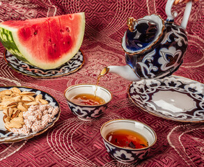 traditional uzbek tea with nuts and watermelon