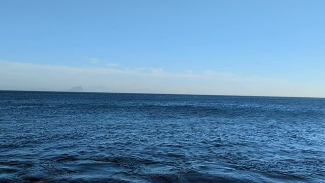 Fishing in the Mediterranean Ocean. A sunny day in Belyounech, Morocco. Blue sky with a clear view, Africa.
