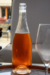 Tasting of grand cru sparkling rose wine with bubbles champagne in old champagne house in grand cru wine producer small village Ambonnay, Champagne, France