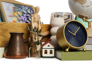 Many different stuff on white background. Garage sale