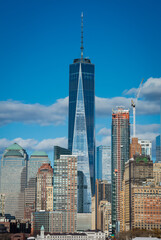 Vertical photo of part of the Manhattan skyline in New York, New York, including the One World Trade Center. The center replaced the Twin Towers, which were destroyed on Sept. 11 2001.