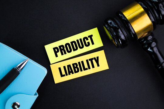 judge's hammer and colored paper with the word Product Liability