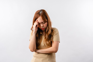 Obraz premium Portrait of displeased offended young Asian woman looks angrily aside doesnt agree with somebodys opinion wears cream clothes isolated over white background