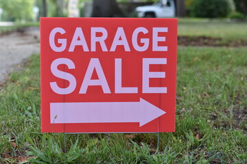 Garage Sale Sign in Grass with Arrow Pointing Right, Small Town USA