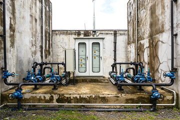 Valves and pipes for wastewater treatment systems. Modern urban therapy facility Powerful pipeline...