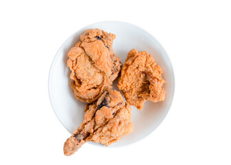 Crispy fried chicken in a plate isolated on white background. Fresh crunchy fried chicken on a white plate. Delicious hot and crispy fried chicken. Image about food of fast food restaurant.