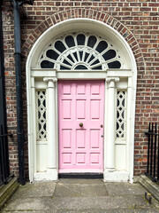 A famous pink painted Georgian door in Dublin, Ireland