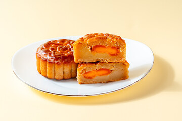A mooncake  is a Chinese bakery product traditionally eaten during the Mid-Autumn Festival.