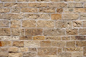 Background from a brown wall made of natural stone - Powered by Adobe